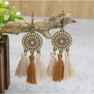 Boho tasseled medallion statement earrings tan cream
